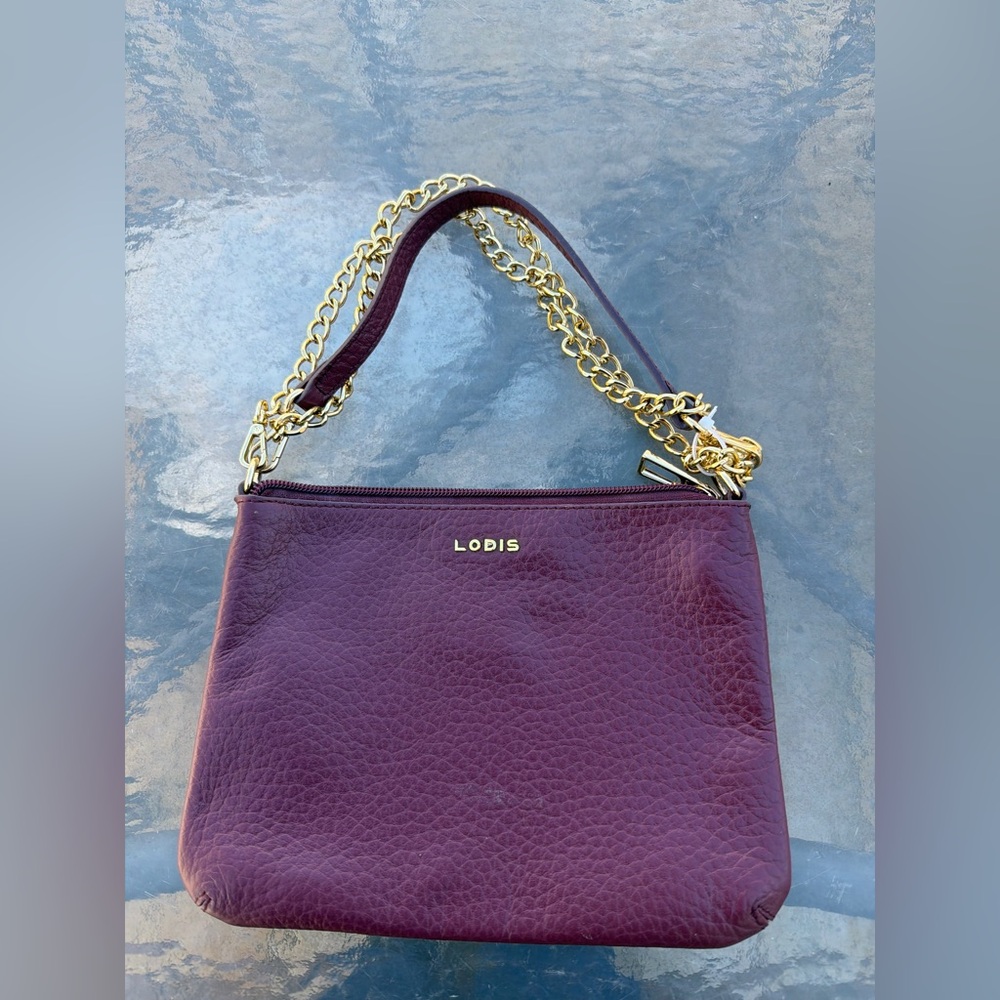 Lodis Plum Pebbled Leather Shoulder Bag with Gold Chain Accent